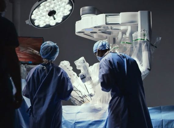 surgeons-in-operating-room-davinci-system.jpg